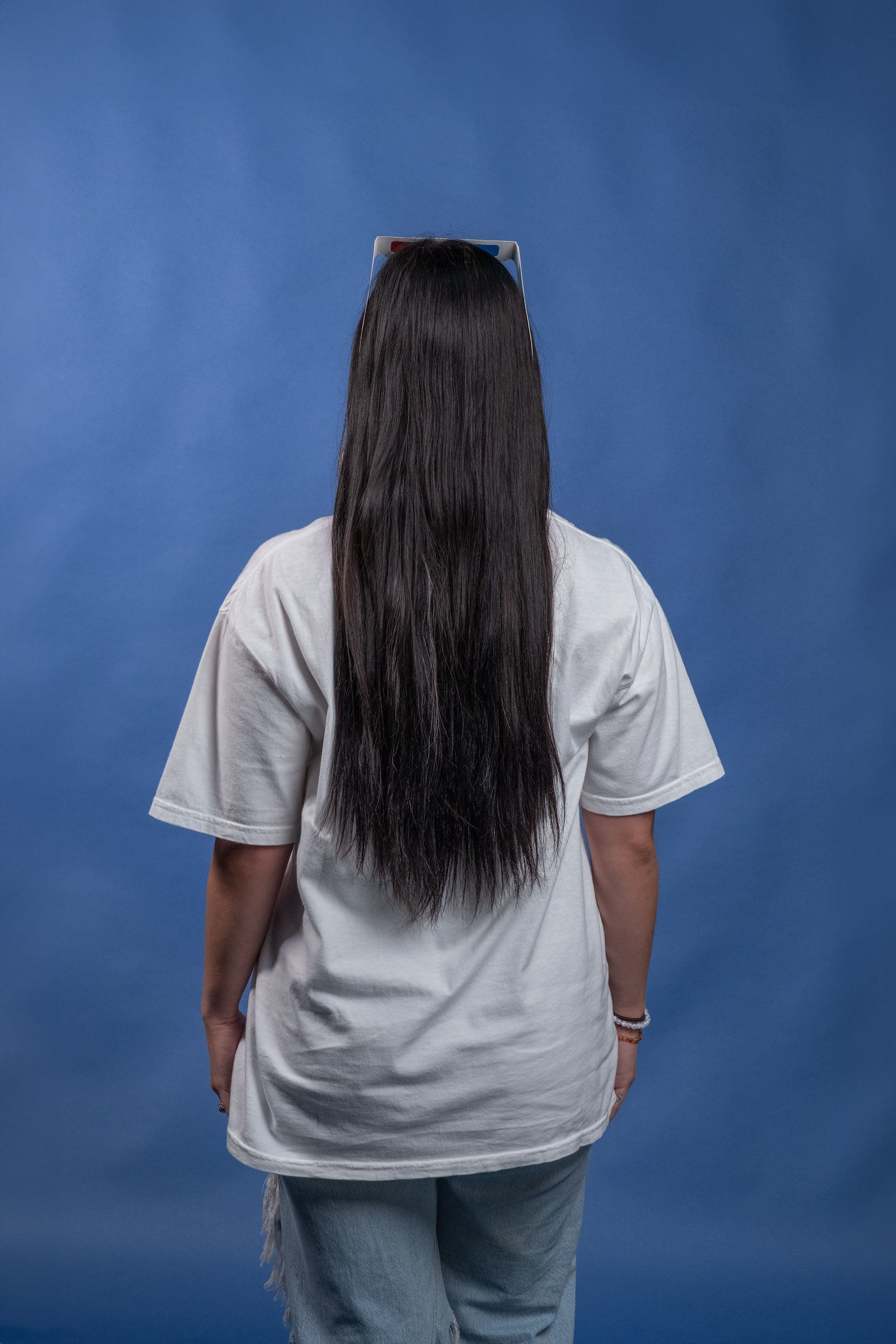 White cotton t-shirt with a 3D screen-printed movie theater design and a pair of 3D anaglyph glasses