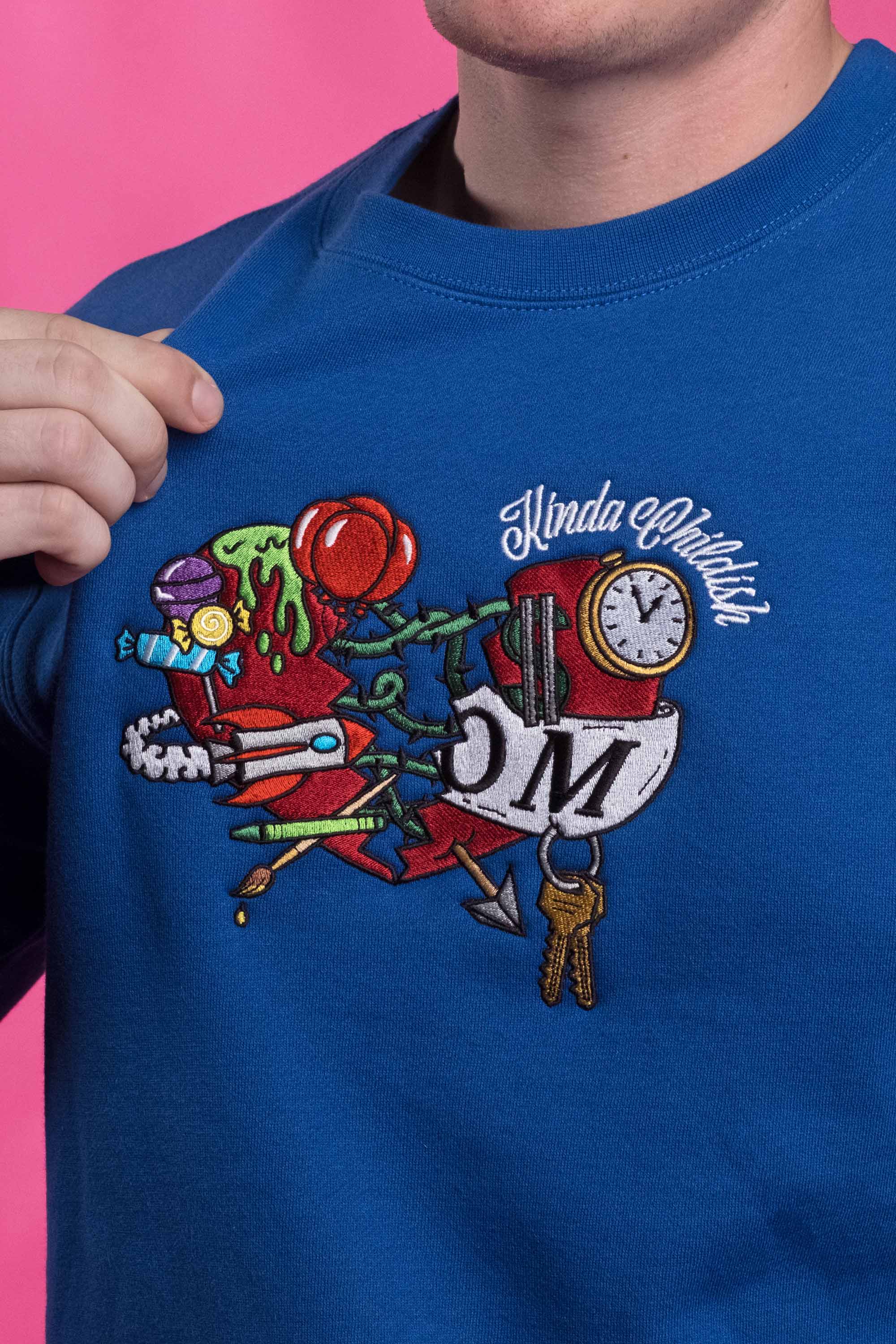 Blue cotton-polyester blend crewneck sweatshirt playful embroidered heart design cozy brushed fleece interior